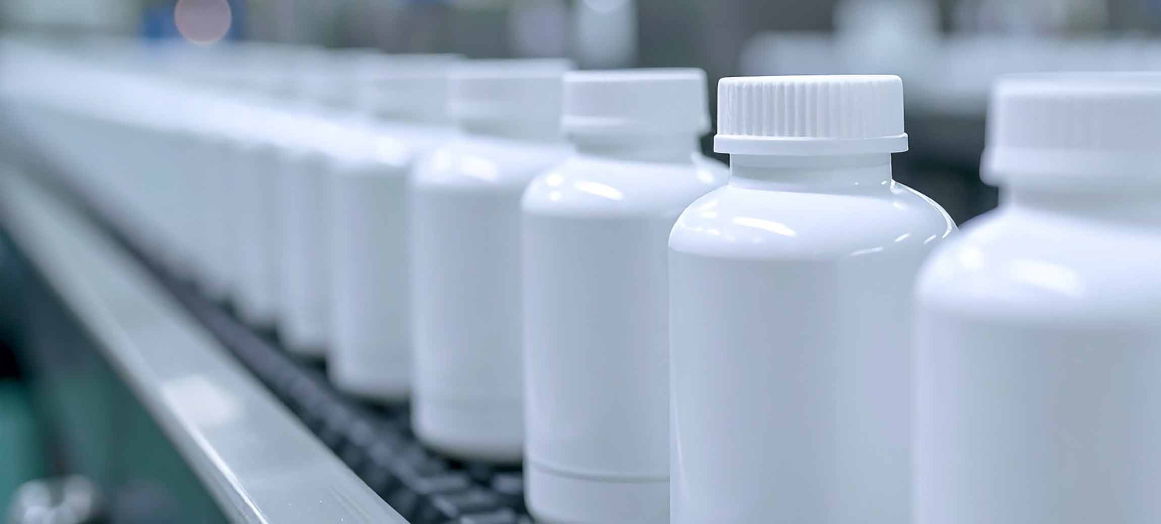 pill bottles on a conveyor belt
